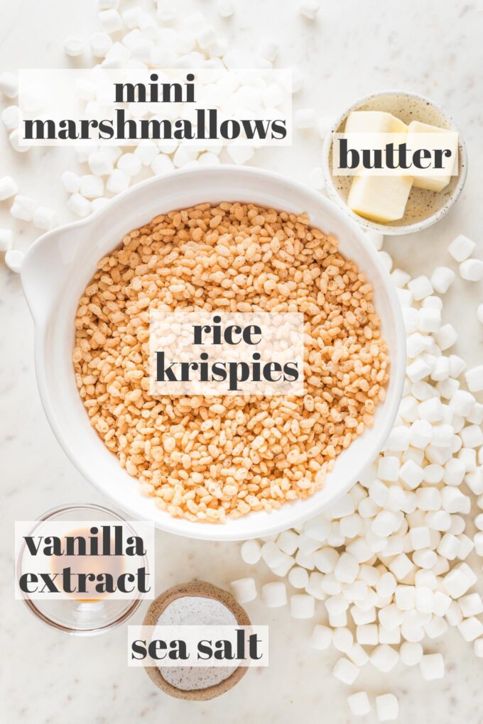 Prep bowls holding Rice Krispies cereal, mini marshmallows, butter, vanilla extract, and sea salt.