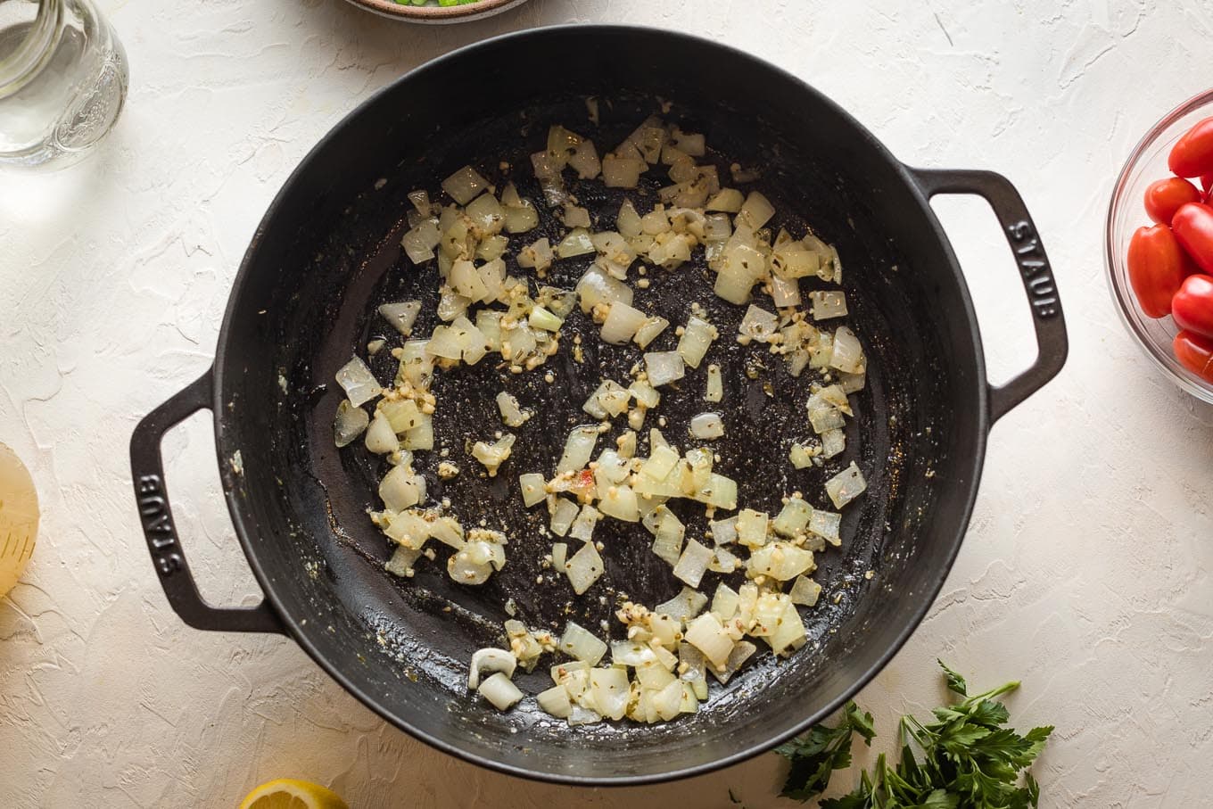 Shrimp removed, onion and garlic cooked in the same skillet.