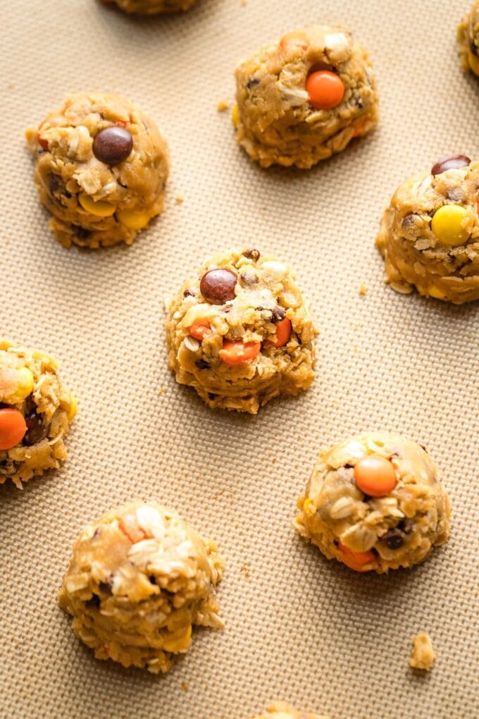 Scooped mounds of cookie dough ready to bake.