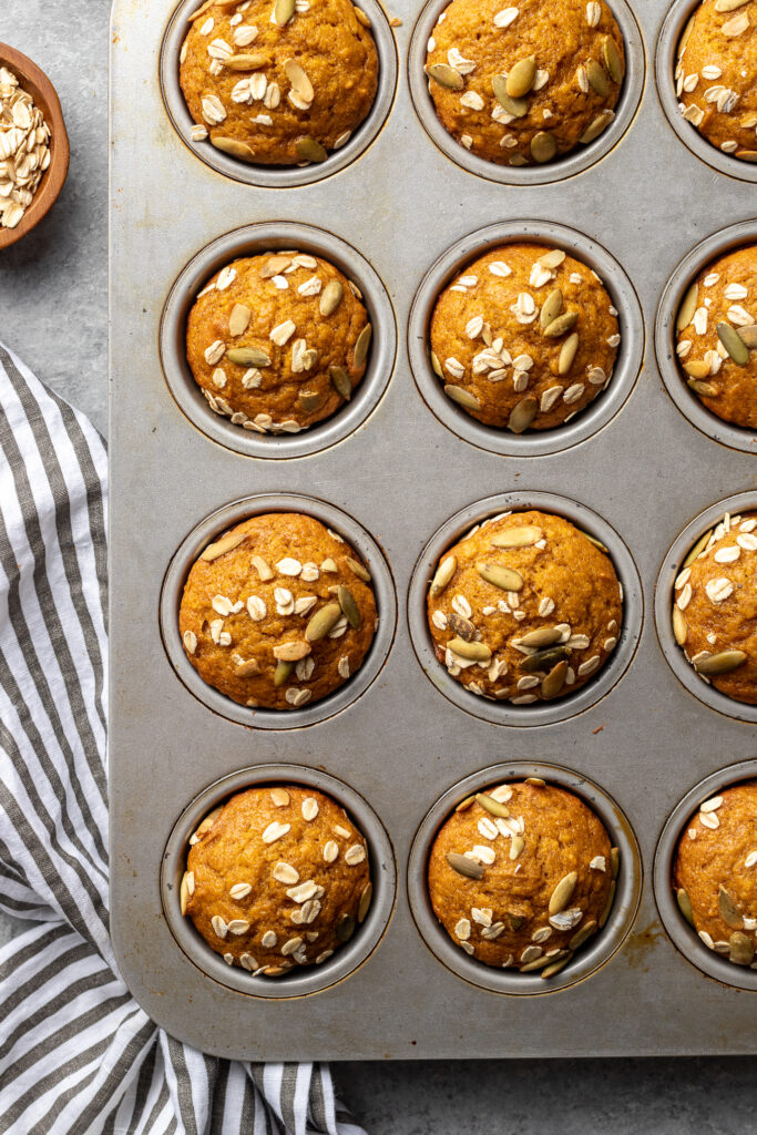 Just-baked pumpkin muffins, still in their tin.