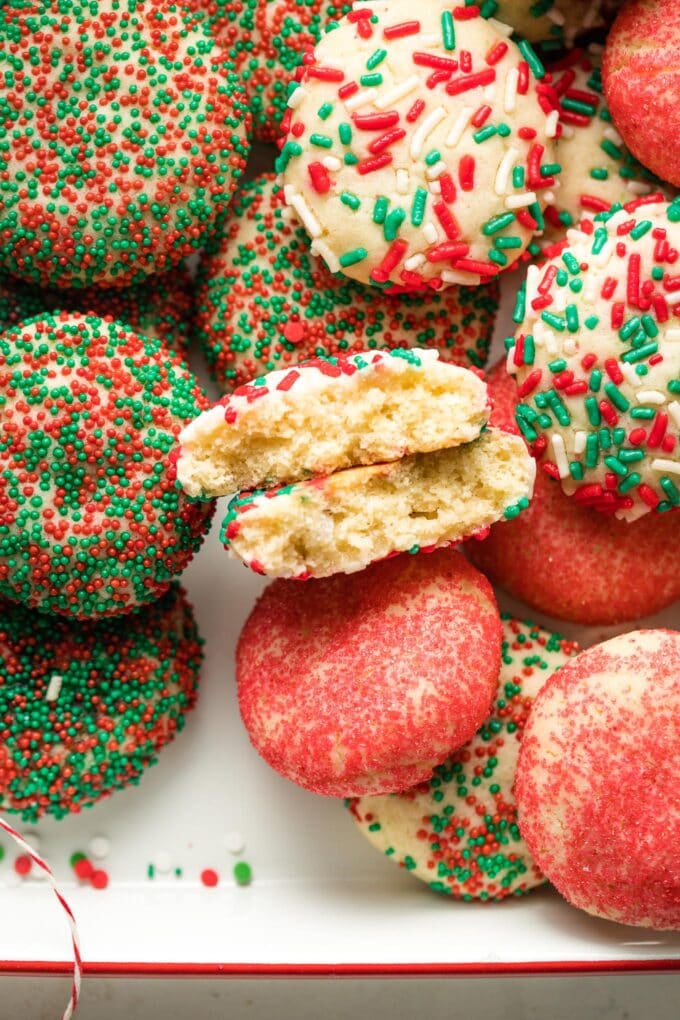 Close-up showing the inside of a sprinkle sugar cookie with Christmas jimmies.