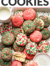 These no-roll, no-cut sugar cookies have a smidge of cream cheese to guarantee a smooth, light texture and are coated in beautiful red and green sprinkles for a festive addition to your cookie tray. This recipe is fun and foolproof!