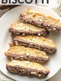 Chocolate-Dipped Almond Biscotti are crunchy, nutty, sweet Italian cookie bliss. Twice-baked and perfect for dunking into a hot cup of coffee or tea, biscotti are an easy and fun treat to make at home.