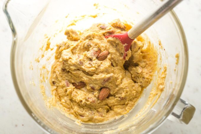 Cookie dough with almonds mixed in.
