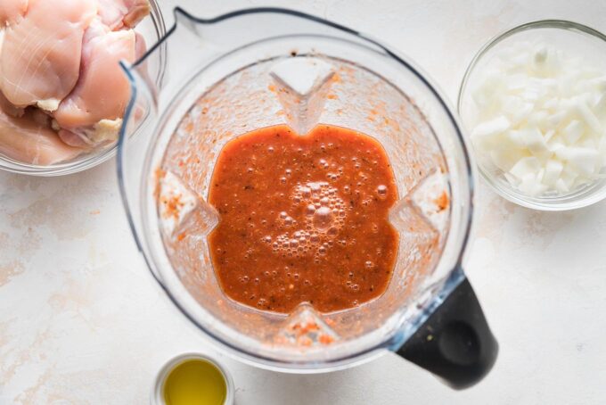 Tinga sauce blended in a high-powered blender.