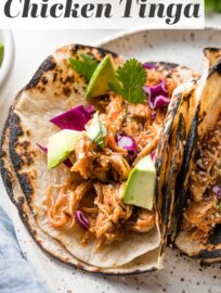 When you want restaurant-quality tacos at home, turn to this Instant Pot Chicken Tinga. It comes together fast, has the most amazing flavor, and is perfect in everything from tacos to burritos to salads to bowls.