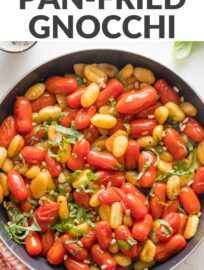 We love that this recipe for Pan Fried Gnocchi with roasted tomatoes and fresh basil is light, flavorful, and comes together in about 25 minutes. It also has an especially nice contrast of textures from the juicy burst tomatoes, crisp edges, and tender interiors of the skillet-cooked gnocchi.