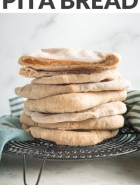 This super simple Whole Wheat Pita Bread blows store-bought versions out of the water! With an unbelievably soft, fluffy texture, a slightly sweet taste, and beautiful pockets, this is the only homemade pita recipe you need.