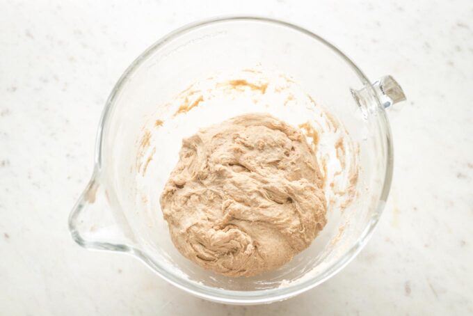 Soft, well-kneaded dough for homemade whole wheat pita breads.