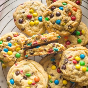 Close up of a chocolate chip M&M cookie.