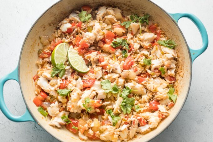 Cooked jalapeno lime fish mixture in skillet, ready to scoop out into tacos.