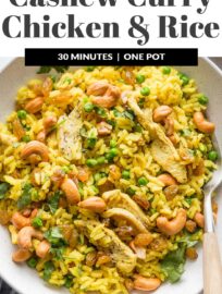 Long among our favorite one pot meals, this quick and easy Curry Cashew Chicken and Rice has tender bites of chicken, crunchy cashews, ginger- and curry-spiced rice, cilantro, and peas all wrapped up in one dish. I love that it's ready in about 30 minutes, most of it hands-off!