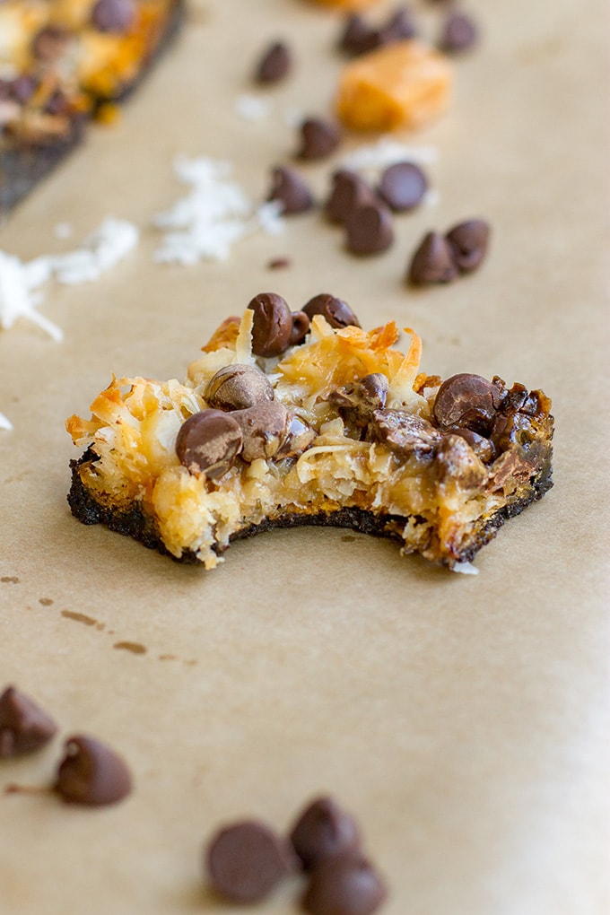 Shortcut Samoa cookie bars | Chocolate chips, caramel sauce, coconut, and an Oreo crust make an easy at-home version of the classic Girl Scout cookie.