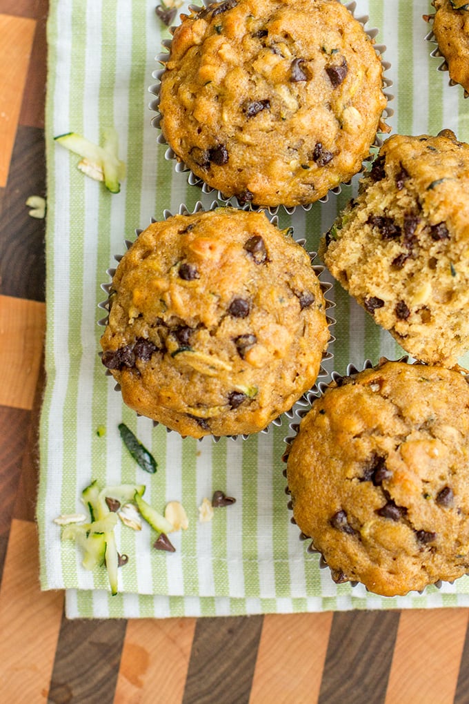 Zucchini chocolate chip muffins made with wholesome ingredients. Perfect for busy mornings, snacks, and encouraging toddlers to eat some green veggies!