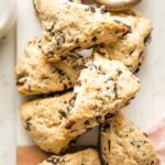 Chocolate chip scones piled on top of each other.
