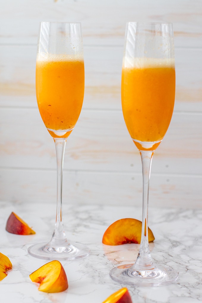 Classic peach bellini | The essential sparkling cocktail with champagne or prosecco and lightly-sweetened peach puree.