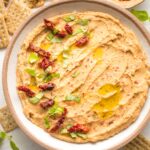 Close-up of sun-dried tomato dip in a bowl.