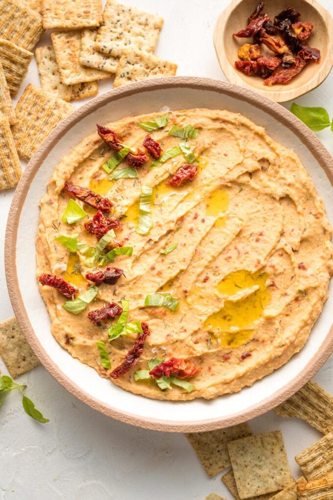 Close-up of sun-dried tomato dip in a bowl.