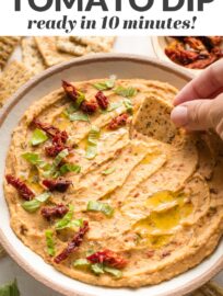 This creamy and delicious Sun-Dried Tomato Dip takes less than 10 minutes to make! Serve it with veggies, crackers, or bread for the perfect crowd-pleasing appetizer.