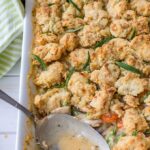 Savory parmesan biscuit crumble chicken pot pie | Ultimate comfort food, chicken pot pie with carrots, celery, mushrooms, a creamy roux, and a simple biscuit topping. #chickenpotpie #comfortfood