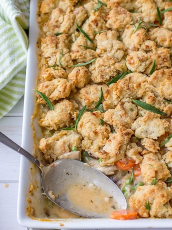 Savory parmesan biscuit crumble chicken pot pie | Ultimate comfort food, chicken pot pie with carrots, celery, mushrooms, a creamy roux, and a simple biscuit topping. #chickenpotpie #comfortfood