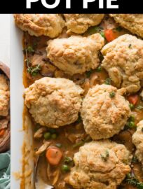 This Biscuit Crumble Chicken Pot Pie is truly an ultimate comfort food meal. It's got a rich, filling interior of tender chicken and a vegetable medley encased in a creamy roux, and is topped with homemade Parmesan biscuit crumbles.
