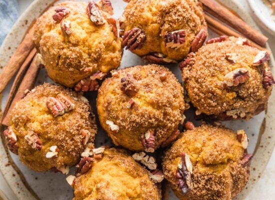 These pumpkin pecan crunch muffins are a delicious and classic fall treat! The tender, richly-spiced muffins pair perfectly with the crackly cinnamon sugar pecan topping. They're also quick and easy to whip up by hand, no fuss required.