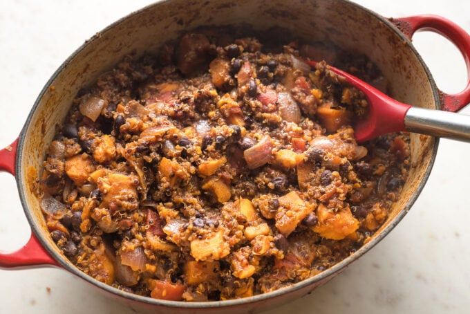 Thick vegetarian chili in a Dutch oven, ready to serve.