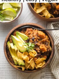 Full of flavor and so simple to make, this sweet potato black bean chili is a delightfully satisfying meatless meal. Vegetarian and vegan friendly! Tender sweet potatoes, hearty black beans, quinoa, and an easy seasoning blend make it so. Serve with avocado, cilantro, and cornbread -- or corn chips!