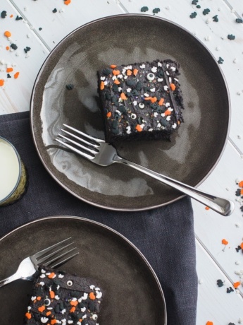 Two slices of spooky blackout chocolate buttermilk cake.