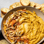 Savory sage pumpkin hummus is a MUST try! It's delicious AND healthy with this easy recipe, and so simple to make with basic ingredients in the blender or the food processor. It's also casually vegan and gluten-free. #pumpkinrecipes