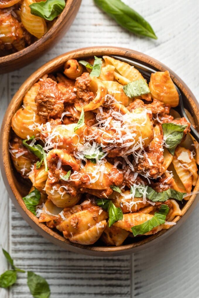 Close-up of shells with easy bolognese sauce and Parmesan.