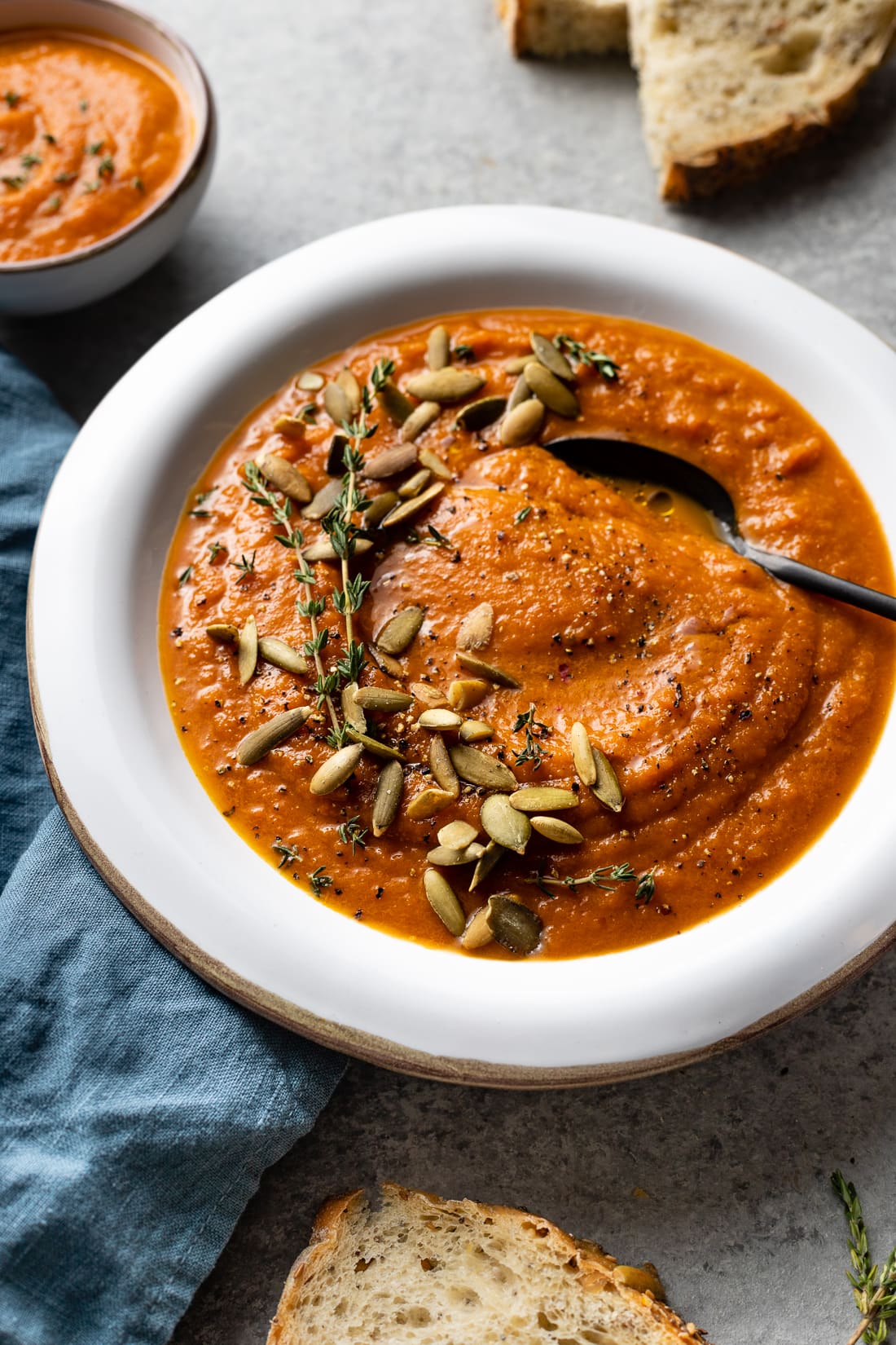 Bowl of creamy carrot red pepper soup.