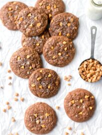 A scattered arrangement of toffee butterscotch brownie cookies.