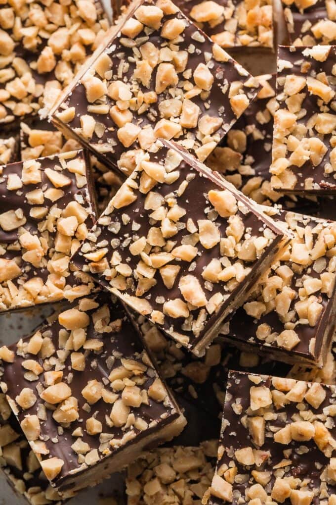 Close up of a plate filled with chocolate shortbread toffee cookie bars.