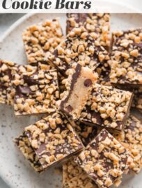 Chocolate Shortbread Toffee Cookie Bars are easy to make and easier to eat! The layered effect -- chocolate chip-studded shortbread with a chocolate coating and generous sprinkle of toffee bits dotting the top -- feels a little fancy but is super quick and easy to achieve.