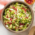 Salad with Brussels sprouts and pomegranate seeds.