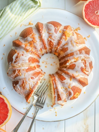 Flat-lay photo of glazed grapefruit bundt cake.