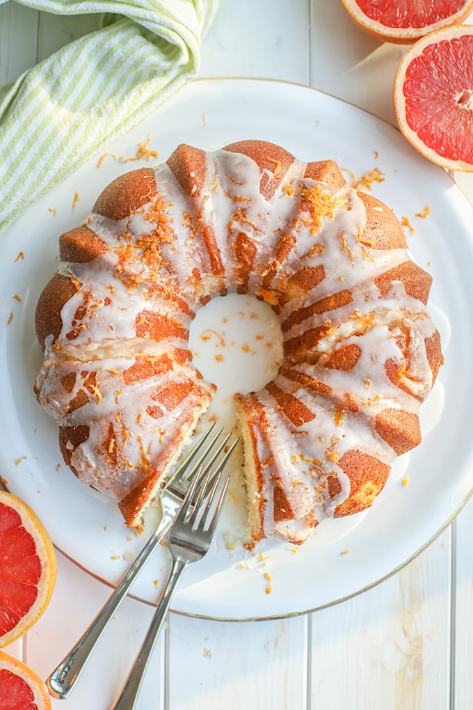 Flat-lay photo of glazed grapefruit bundt cake.