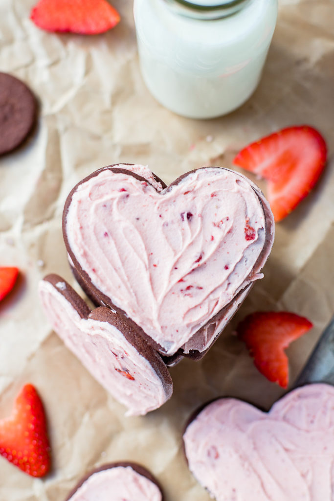 Flat-lay close-up of a heart-shaped chocolate sugar cookie.