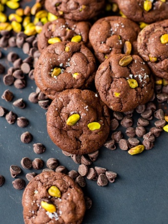 A pile of sea salt pistachio chocolate chip cookies.