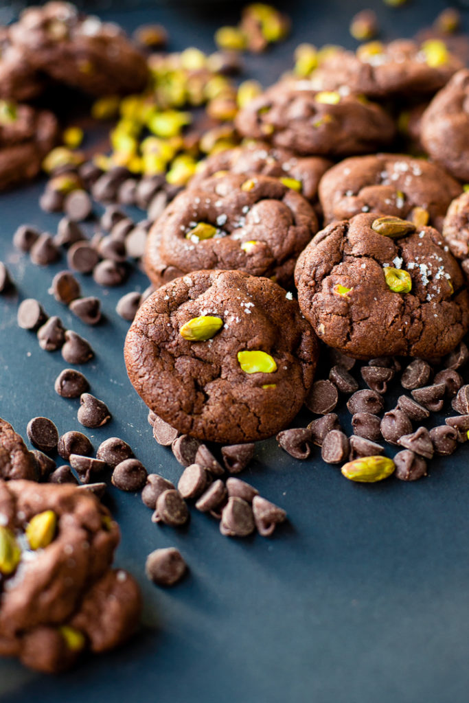 A pile of sea salt pistachio chocolate chip cookies.