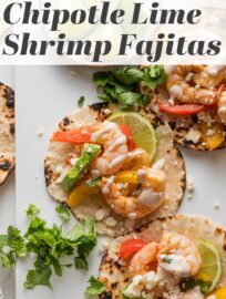 Sheet Pan Shrimp Fajitas make a seriously simple and tasty weeknight dinner! Tender shrimp, peppers, and onions are seasoned with a chipotle lime blend then roasted together, leaving you minimal prep work and clean-up. Add some warm tortillas, guacamole, and chipotle crema to send this meal over the top.