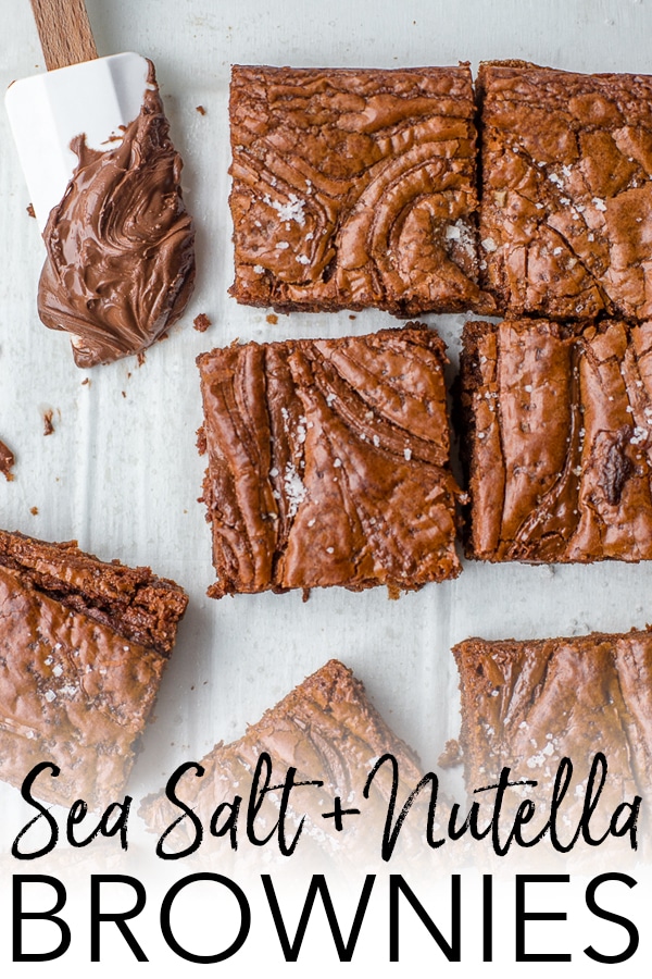 Chocolate hazelnut spread, Nutella, adds the most rich chocolate flavor to these chewy, irresistible brownies topped with a bit of sea salt. #nutella #nutellarecipes #brownies