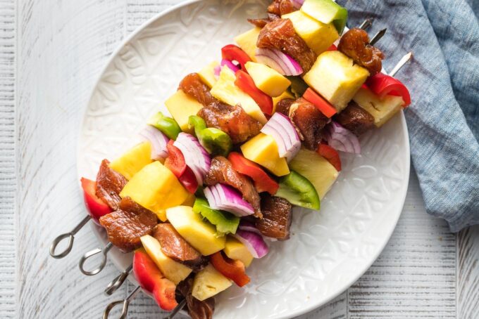 Pork pineapple kabobs ready to grill.