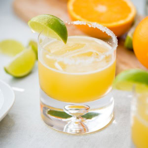 Close-up of a cocktail glass filled with a skinny margarita.