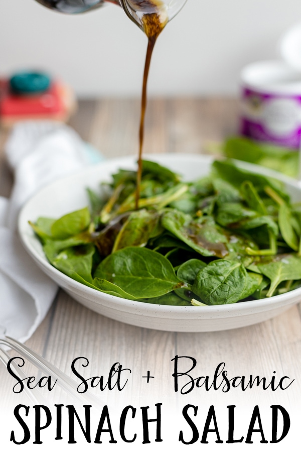 A light, easy side salad recipe, this balsamic spinach salad with coarse sea salt is perfect for rounding out a busy weeknight menu. Ready in less than 5 minutes, including the time you'll need to make a simple, perfect homemade balsamic salad dressing. #spinachsalad #balsamicvinaigrette