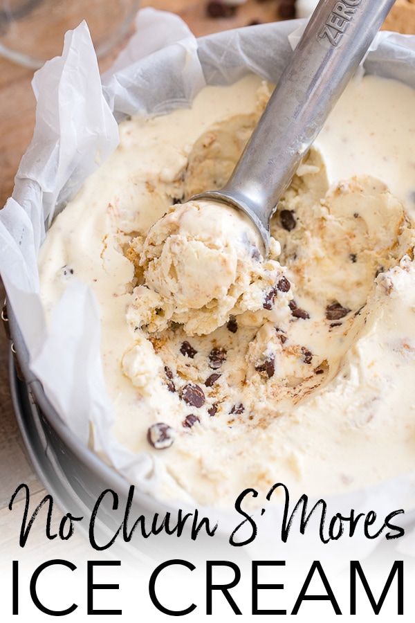 A huge summer hit - the best easy recipe for no-churn ice cream packed with all the flavor of s'mores, real graham crackers, chocolate, and mini marshmallows. The perfect BBQ dessert or treat to make with your kids on vacation! #nochurnicecream #smoresicecream #summerrecipes 