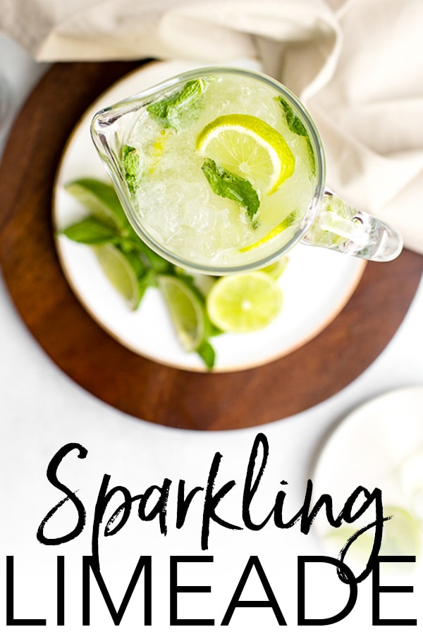 The ultimate summer drink recipe - sparkling limeade with simple syrup and mint! It's so fast and easy to make this non-alcoholic classic crowd-pleaser for your next summer gathering! #limeade #summerrecipes #drinks
