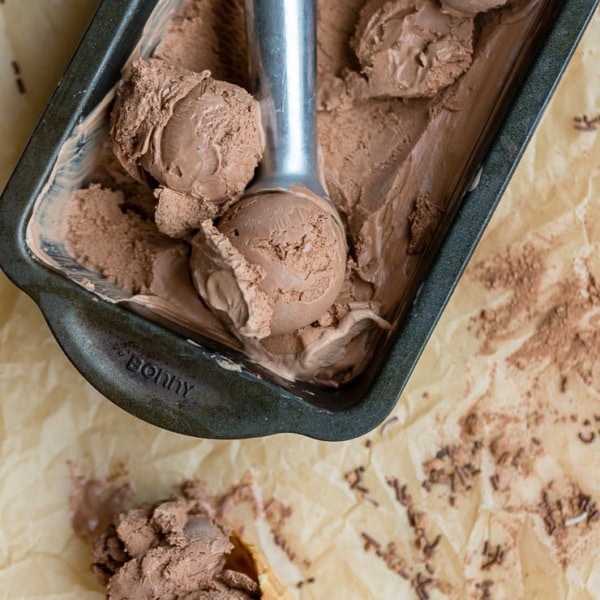 A loaf pan holding French style double chocolate ice cream.